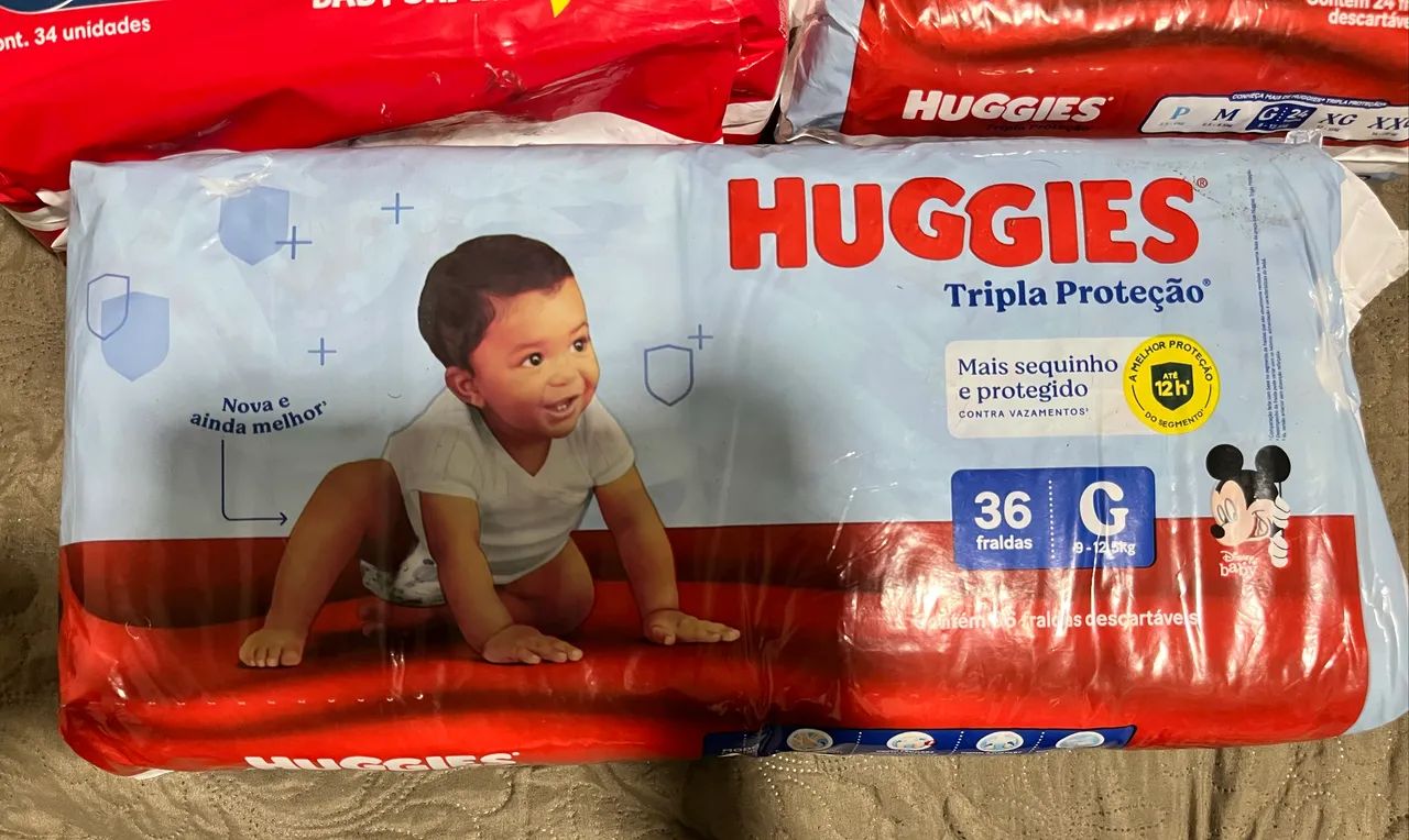 Três pacotes de fraldas - Foto 4
