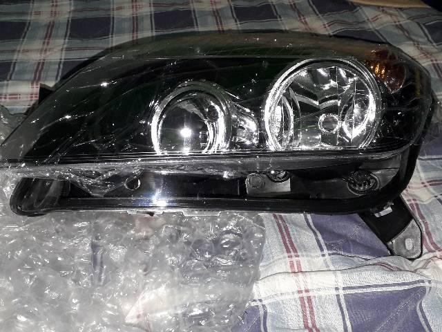 Farol Vectra lado esquerdo!! Novo