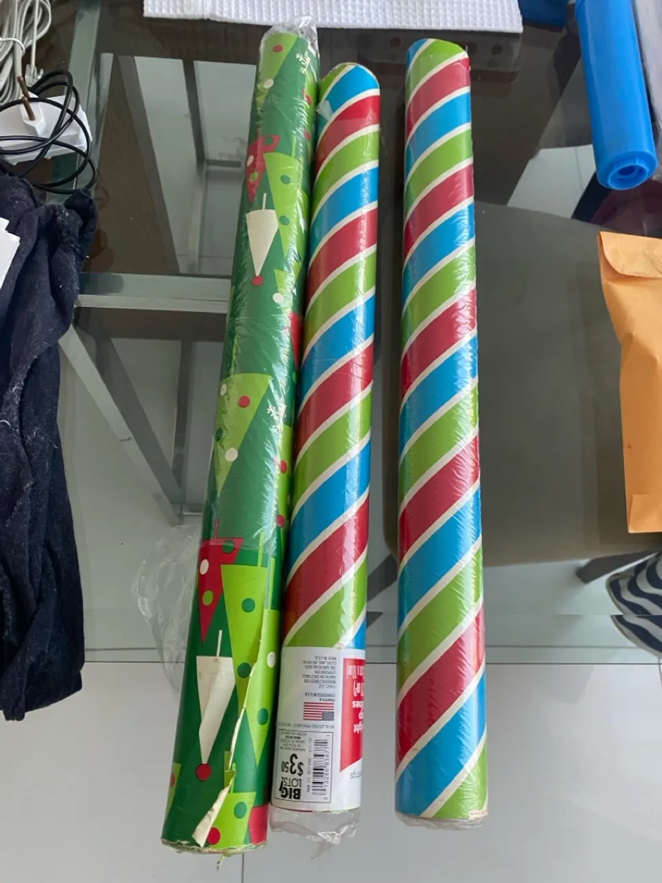 Rolos de papel de presente conforme fotos