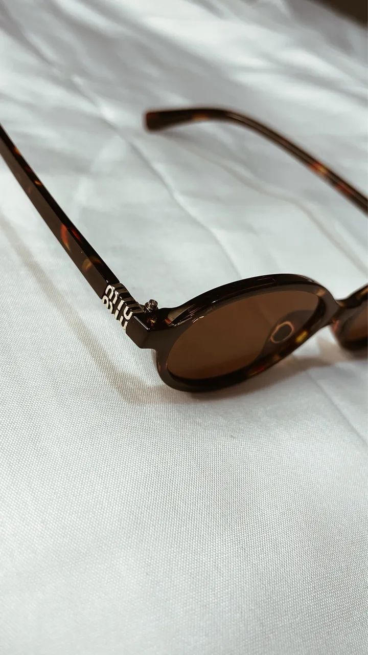 óculos de sol miumiu - Foto 4