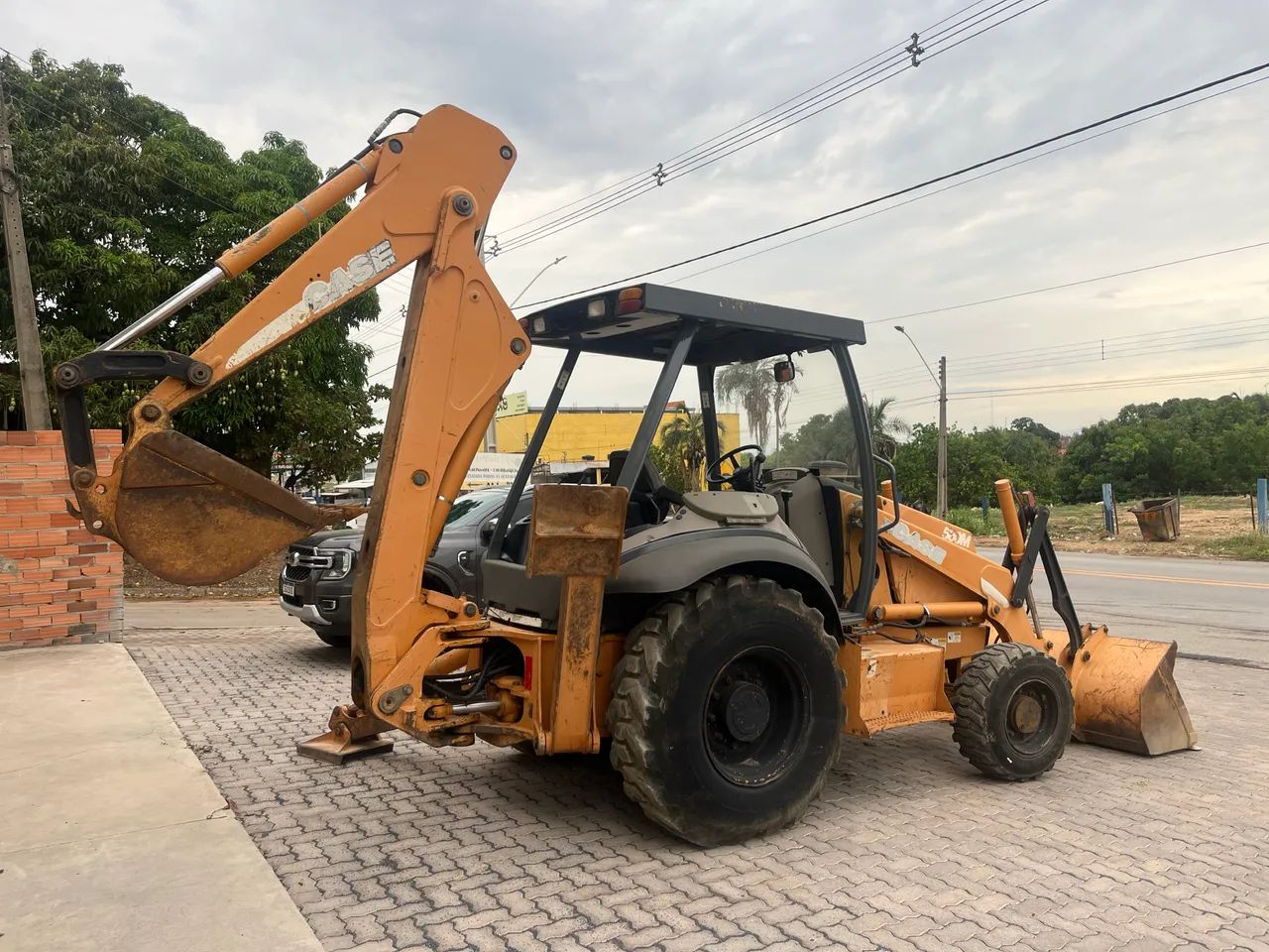 Retroescavadeira case580m