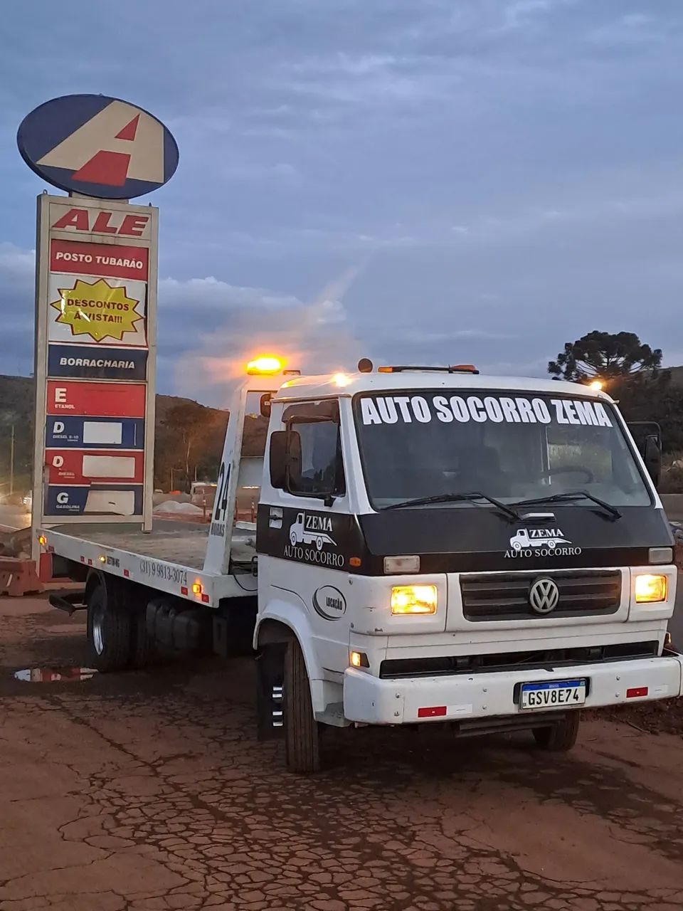 Caminhão prancha com asa delta 