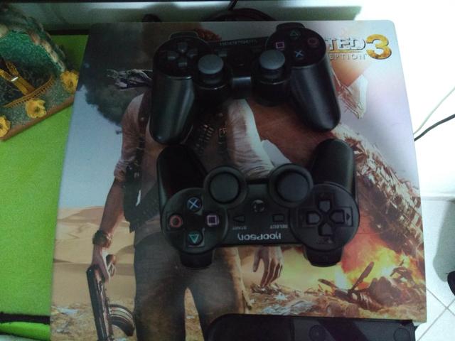 PS3 com 2 controles e 13 jogos - Foto 2