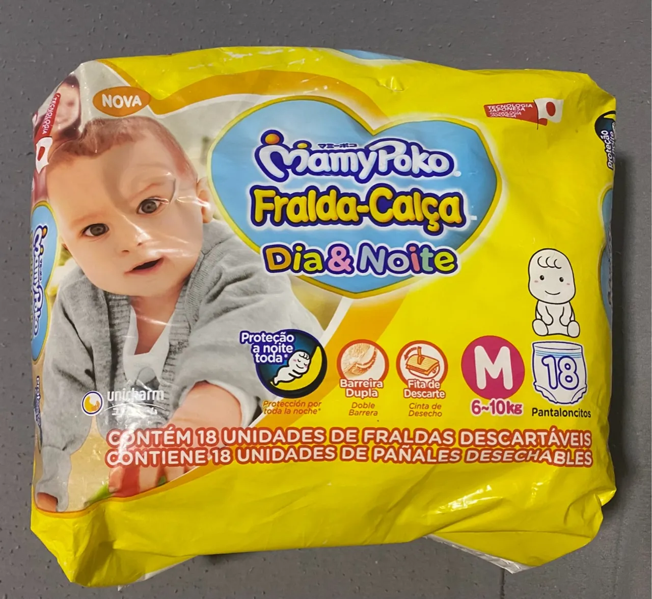 2 pacotes de Fraldas Mamypoko Dia e Noite - 18 unidades cada pacote