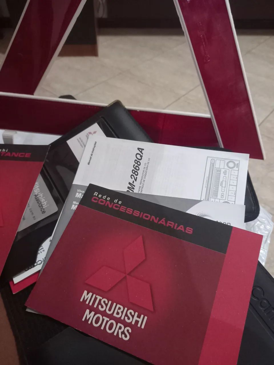 Manual e triangulo do Mitsubishi Airtrek - Foto 4