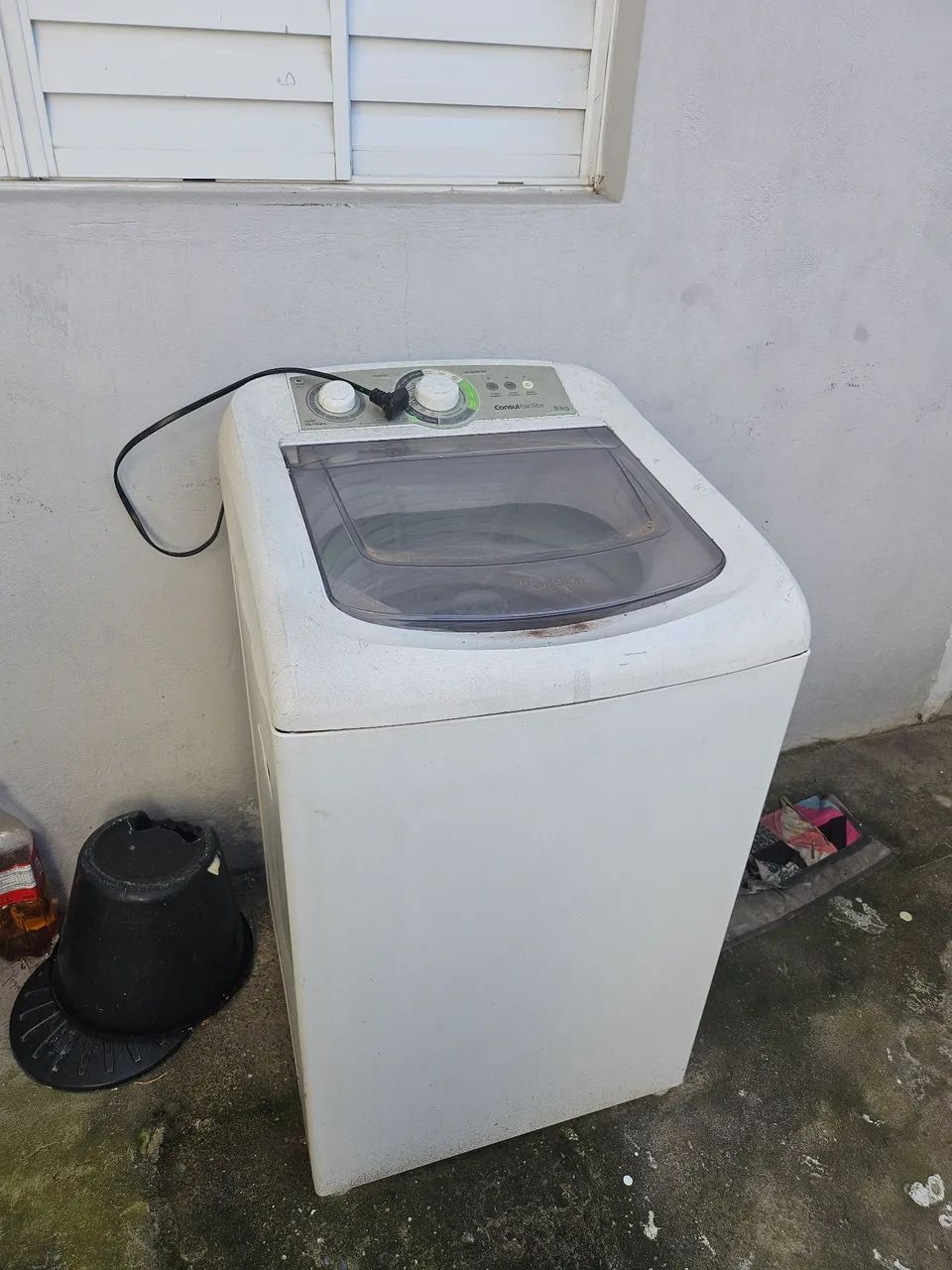 Máquina de lavar com defeito