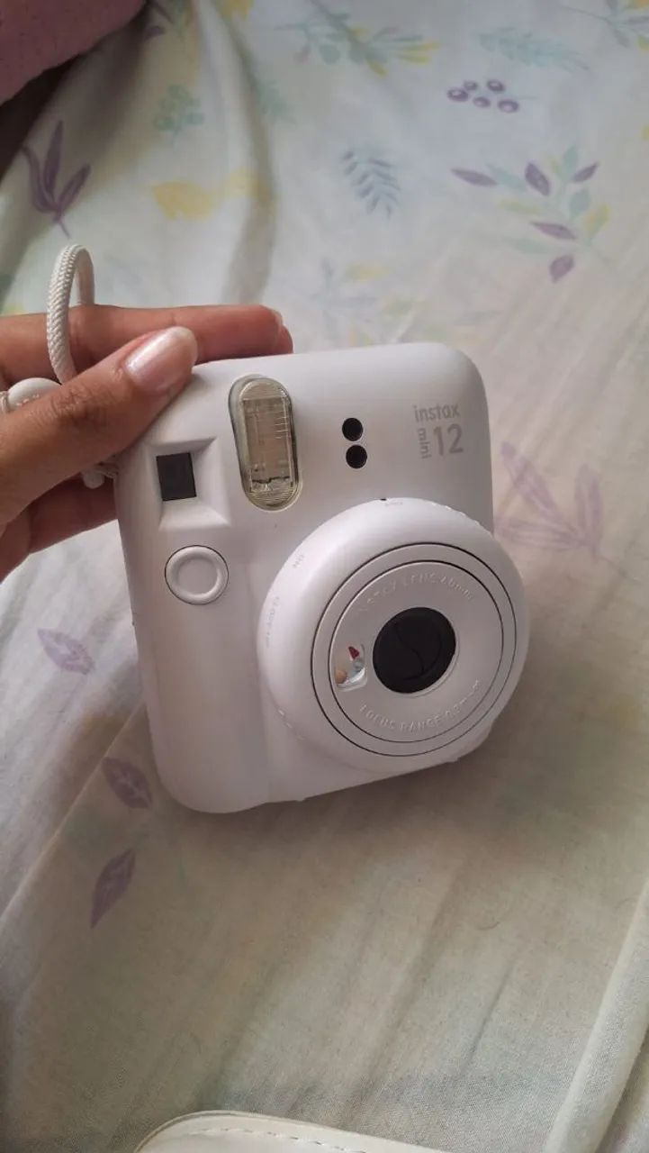 Câmera instax mini 12 e itens