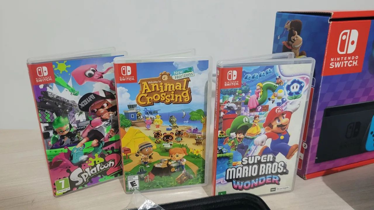 Nintendo Switch + jogos + acessório - Foto 2