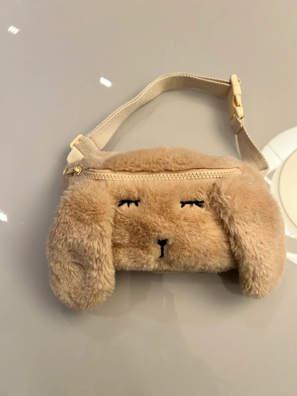 Pochete de pelúcia Zara