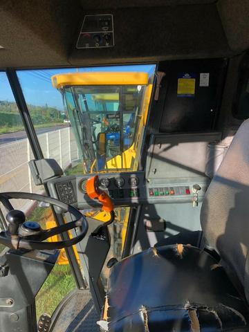 Colheitadeira Marca New Holland, modelo TC57, ano 2001, Arrozeira - Foto 6