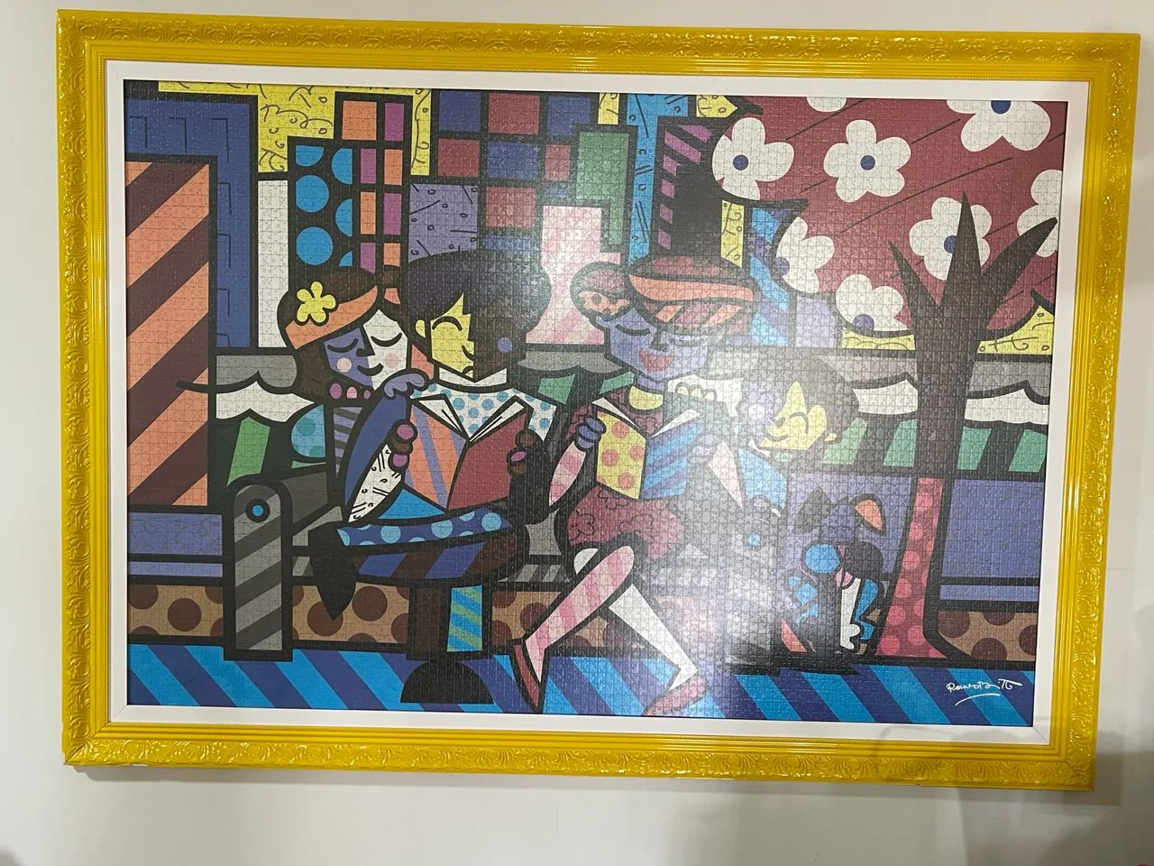É um quadro no estilo do Romero Britto (Pop Art), com cores fortes e formas geométricas.
