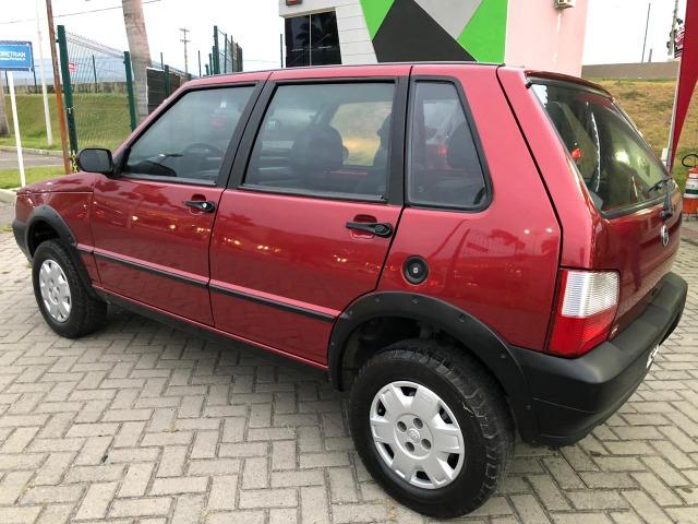 Fiat uno mille fire 4p completão com direção hidráulica pneus novos - Foto 3