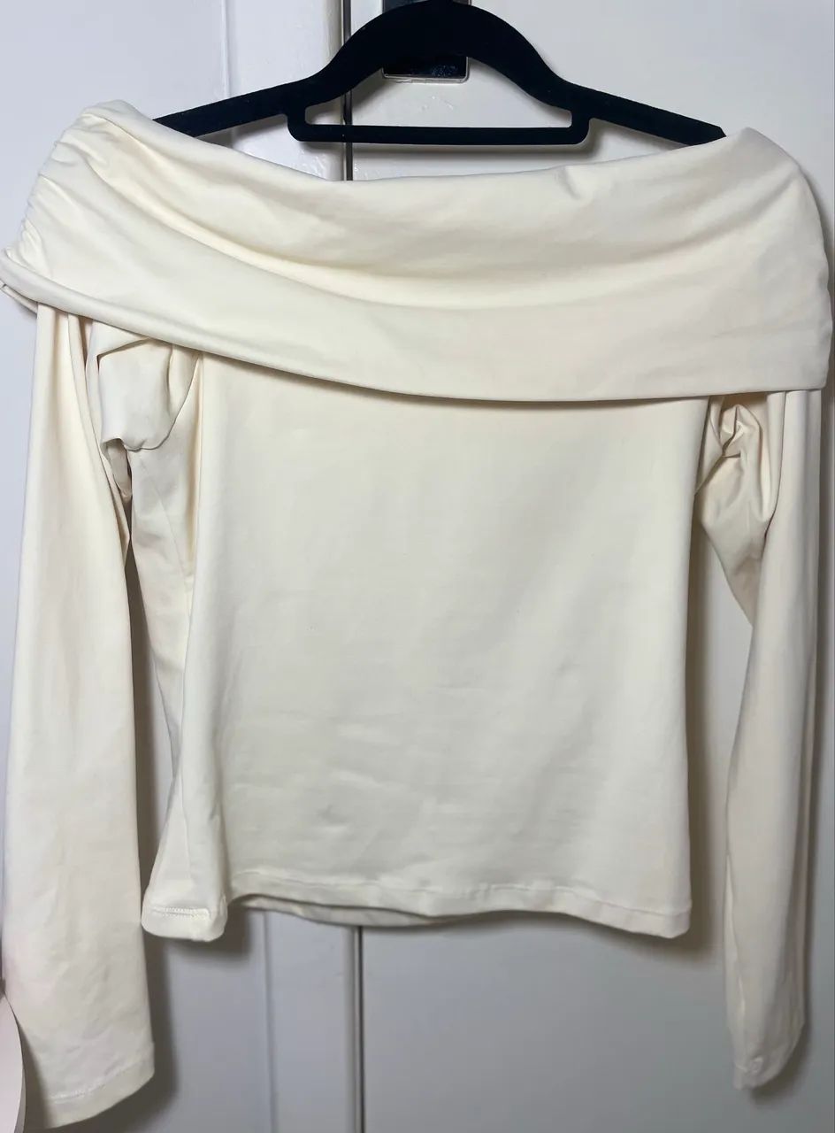 Blusa drapeada de manga longa