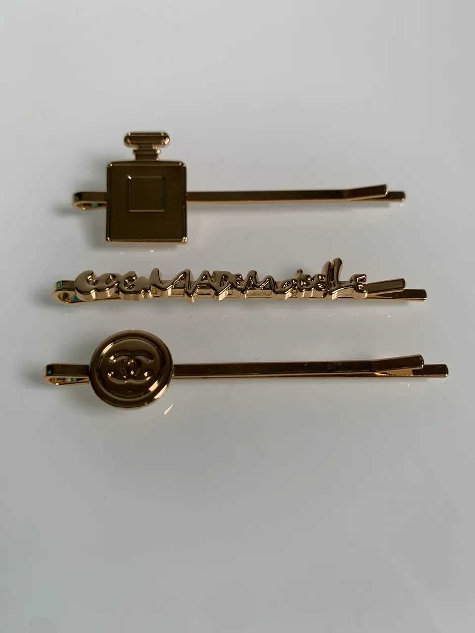 Grampos de cabelo Chanel