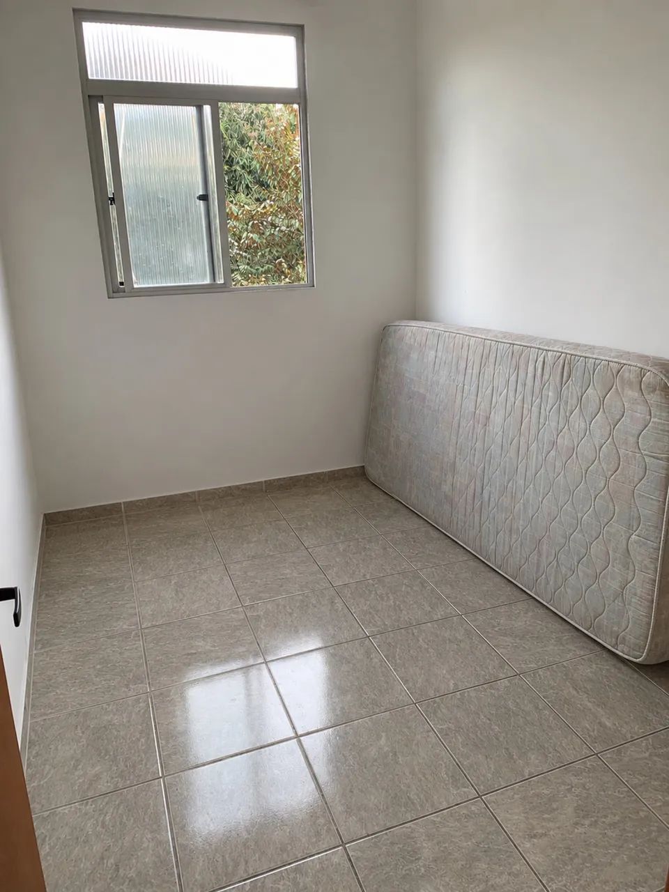 Quarto em casa compartilhada