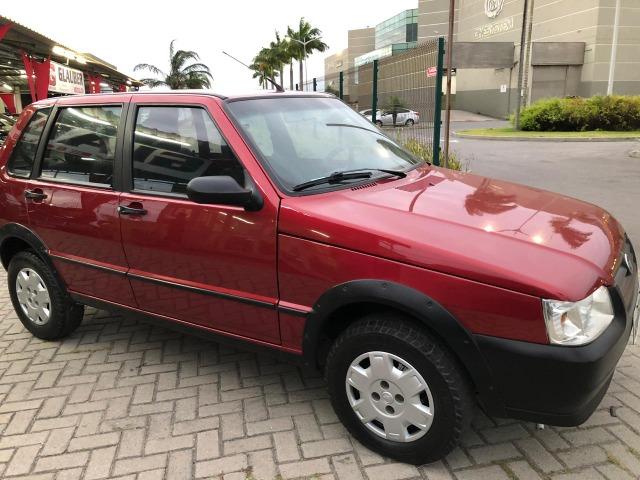 Fiat uno mille fire 4p completão com direção hidráulica pneus novos - Foto 6