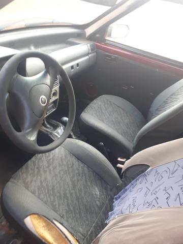 Troco Fiat Uno ou vendo - Foto 3