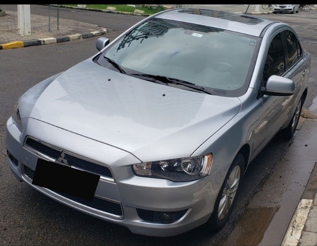 Mitsubishi Lancer HLE (com teto solar)