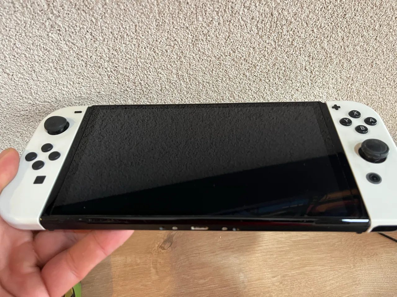 Nintendo switch Oled + 2 jogos - Foto 3