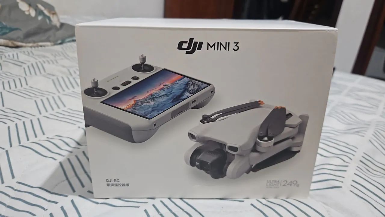 DRONE DJI MINI 3 COM TELA,USADO SÓ P.TESTAR, SEM MARCA DE USO.F: *.