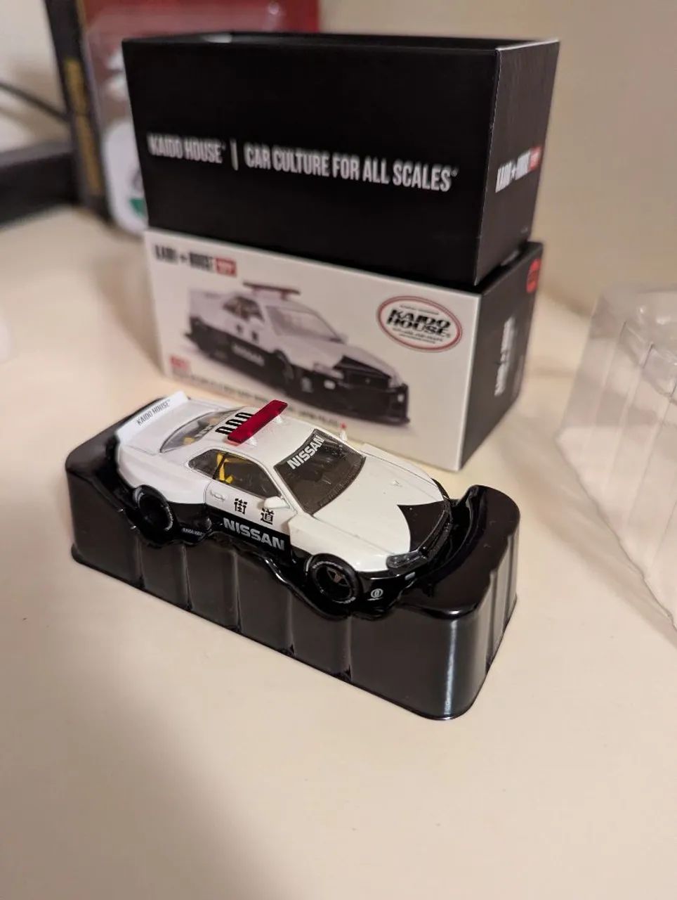 Kaido House X Mini GT GT-R R34 japan police - Brinquedos e Jogos