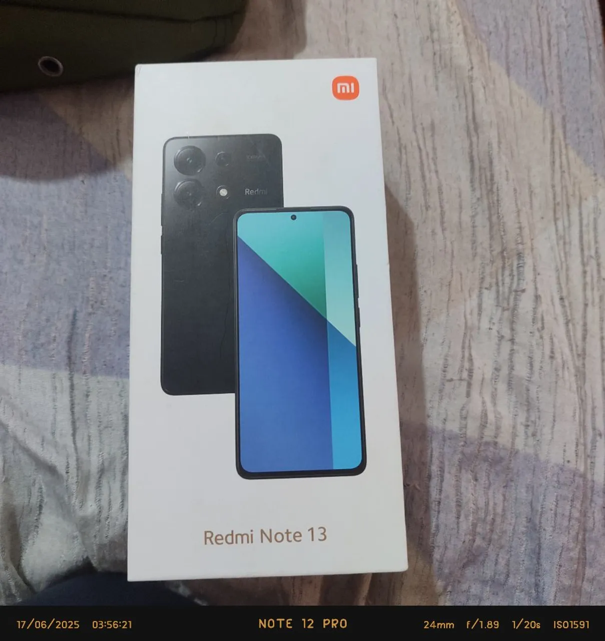 Vendo celular xiaomi Redmi note 13 com 10 meses de uso. De brinde um fone Air dots.
