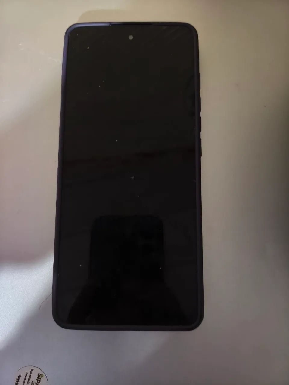 Celular Motorola com tela trincada