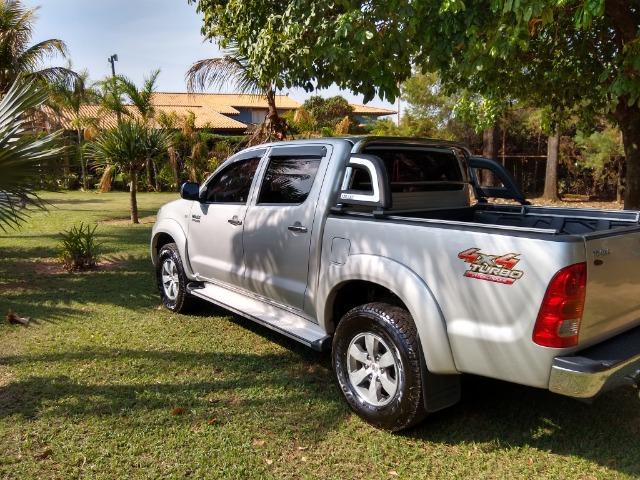 Hilux, ano 2010, 3.0, câmbio automático, modelo SRV - Foto 9