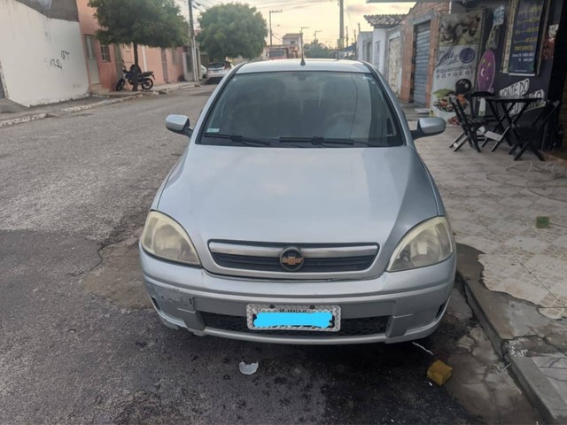 CORSA HATCH PRATA CARA DE GATO 2011