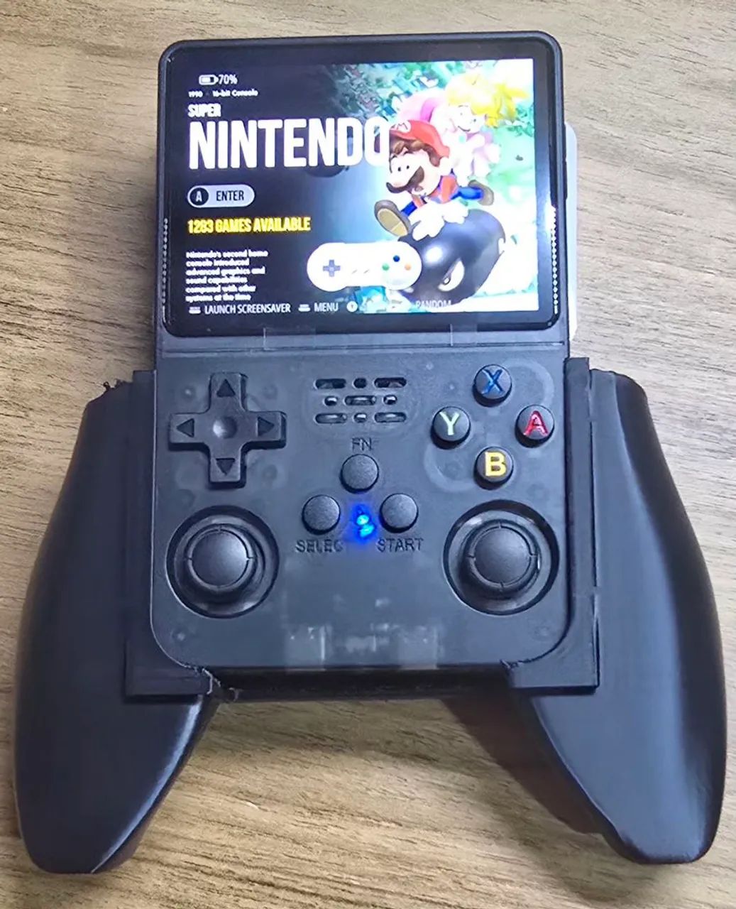 Console portátil R36S com acessórios  - Foto 2