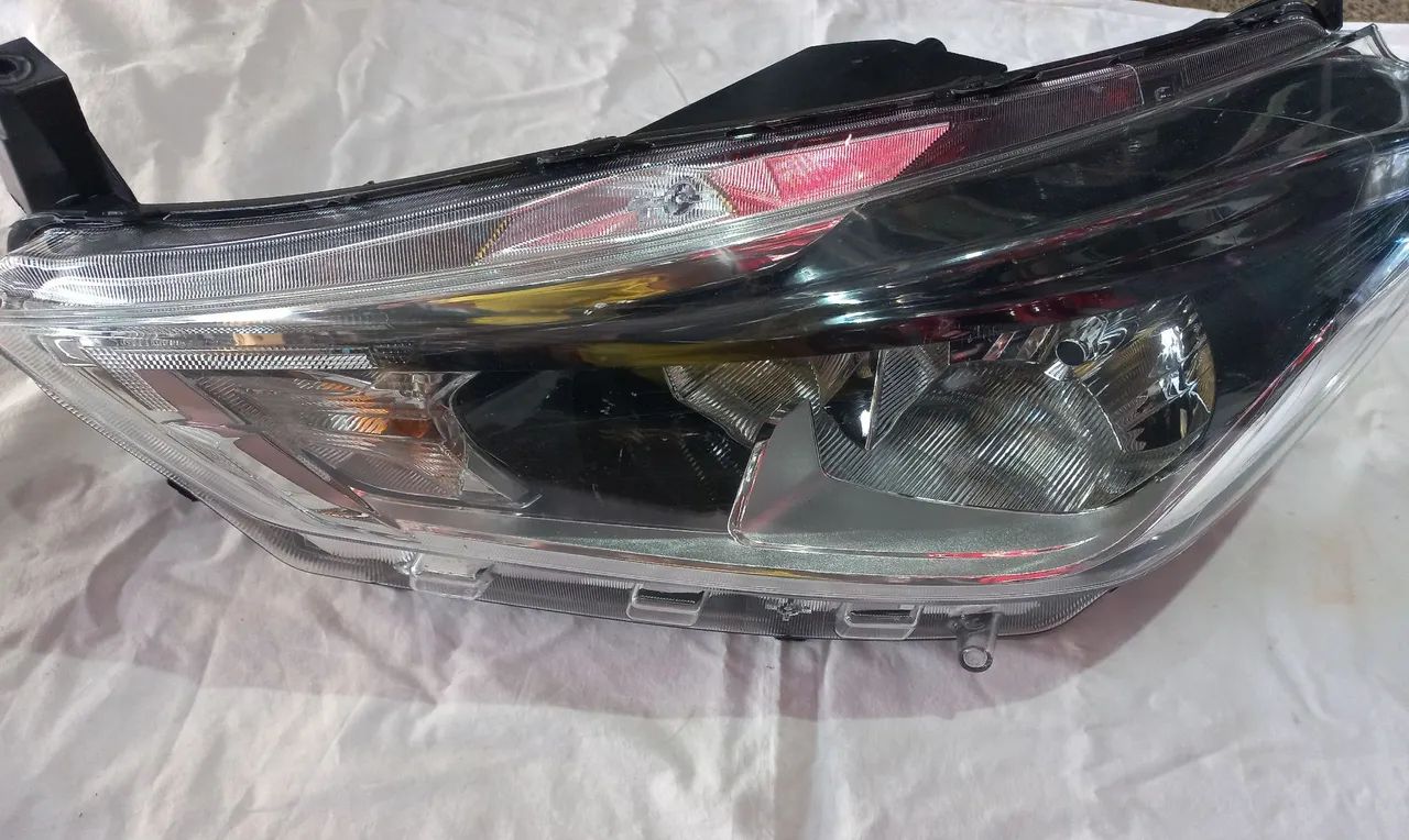 FAROL KIKIS SEM LED ESQUERDO 