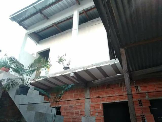 Casa, dois apartamentos e laje em construção - Foto 2