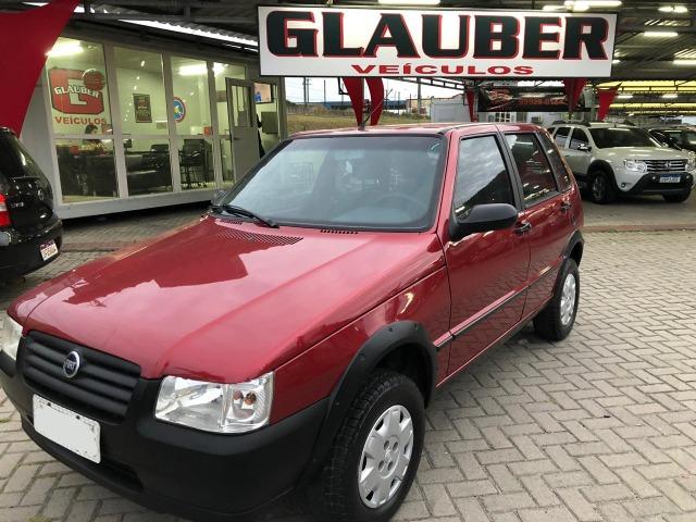 Fiat uno mille fire 4p completão com direção hidráulica pneus novos - Foto 4