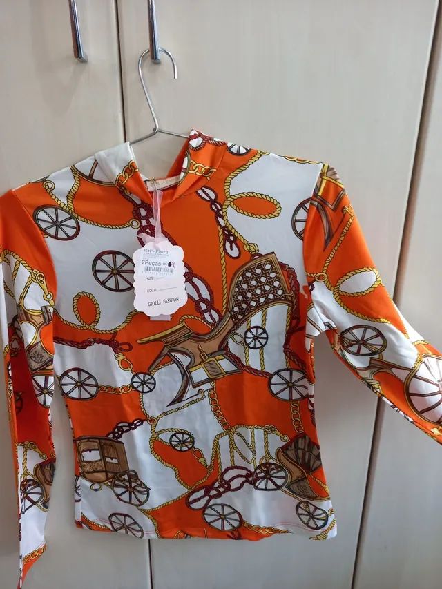 Blusa de manga comprida e com estampas - Foto 3
