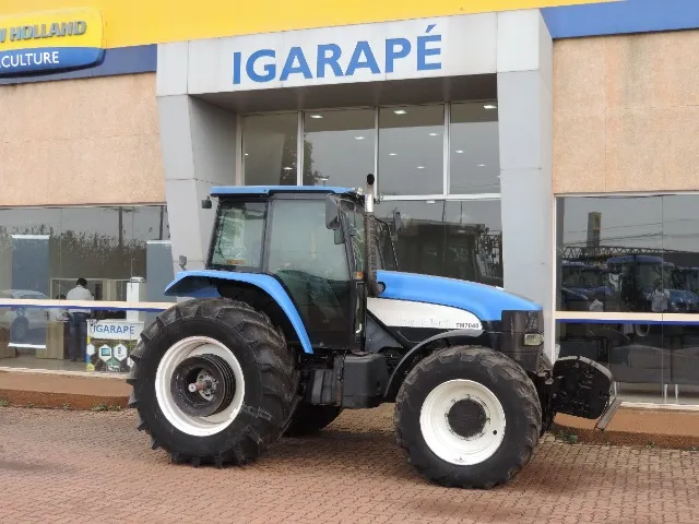 Trator New Holland - TM 7040 Cabinado - 4×4 - 180cv - Ano 2012