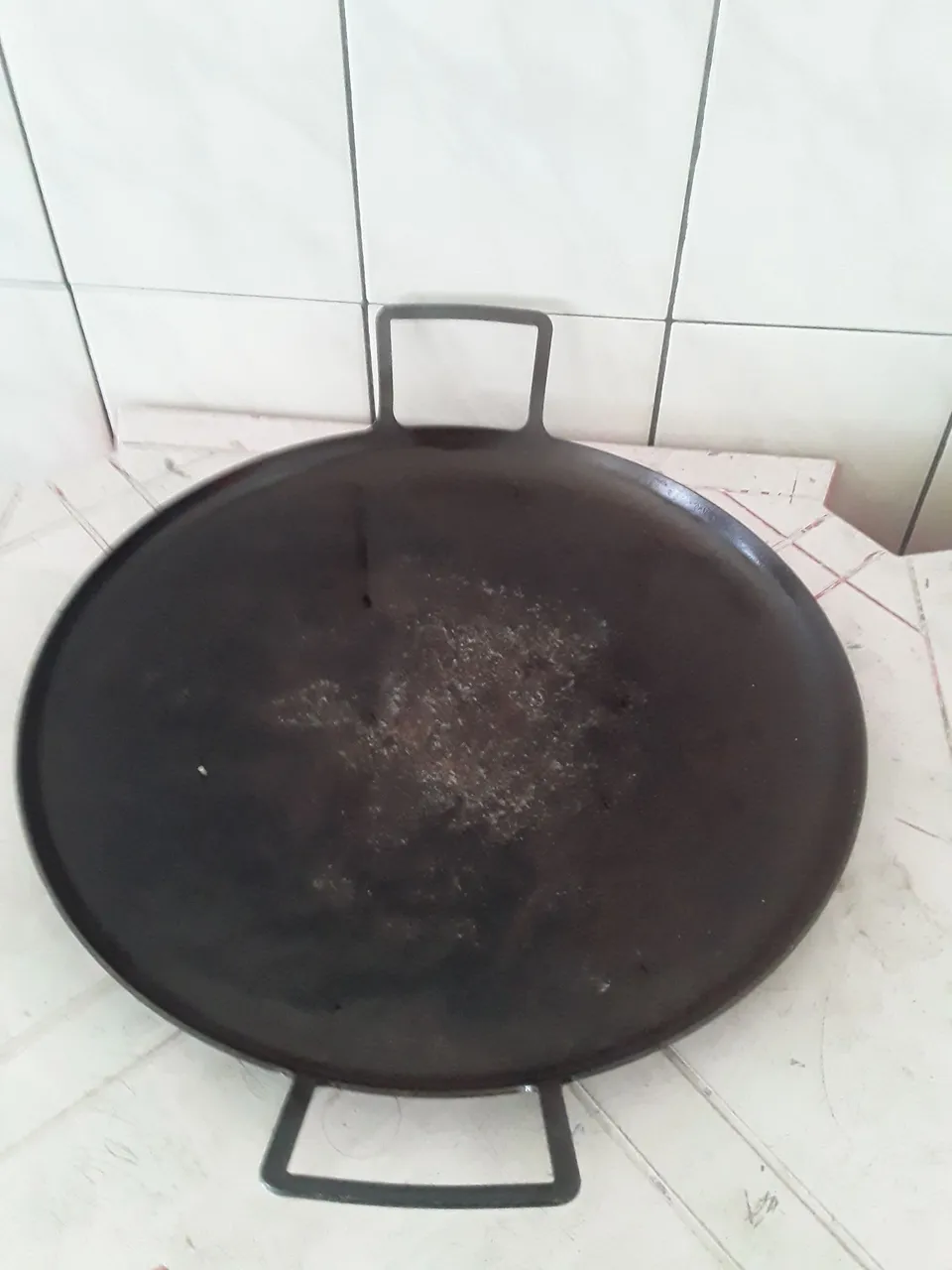 Tacho chinês em ferro fundido