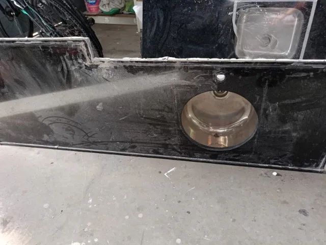 Bancada de cozinha com cuba em inox redonda