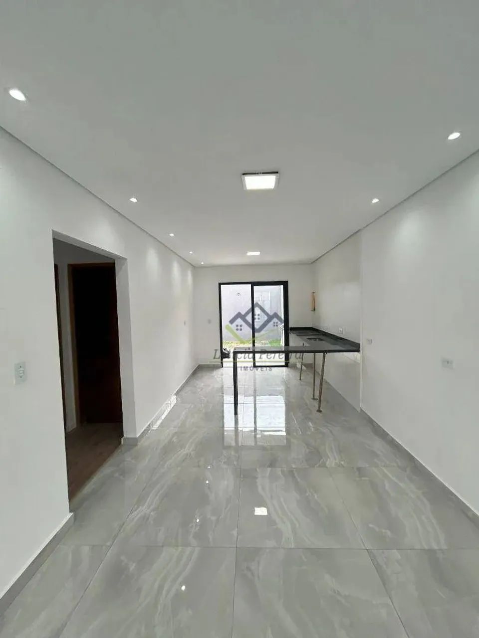 Casa com 3 dormitórios à venda, 80 m² por R$ 650.000 - Vila Lavínia - Mogi das Cruzes/SP