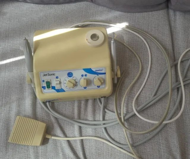 Ultrassom e jato de bicarbonato 