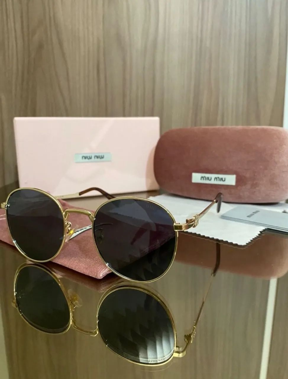 Óculos de sol Miu Miu 