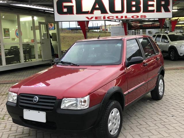 Fiat uno mille fire 4p completão com direção hidráulica pneus novos