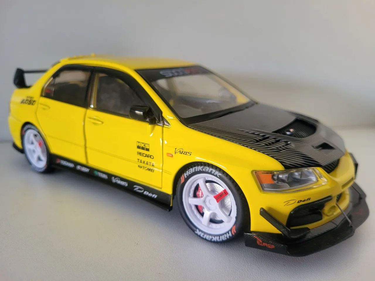 Miniatura Lancer Evolution 1/24, três cores - Foto 3
