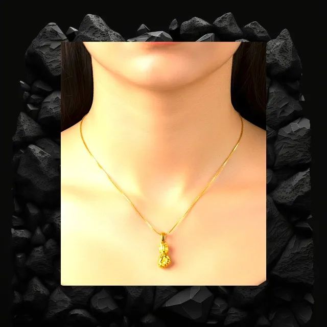 Corrente de Ouro Com Pingente em Formato de Figa