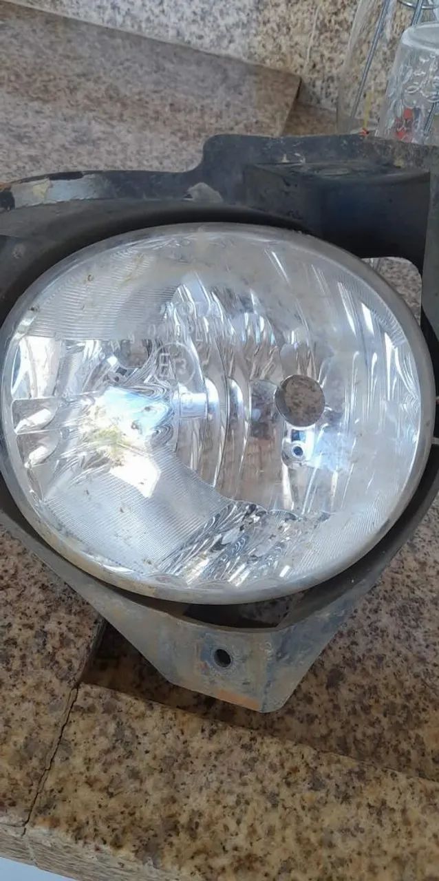 Farol de milha hilux ano 2009 a 2011 original lado direito 