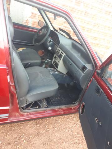 Troco Fiat Uno ou vendo - Foto 4