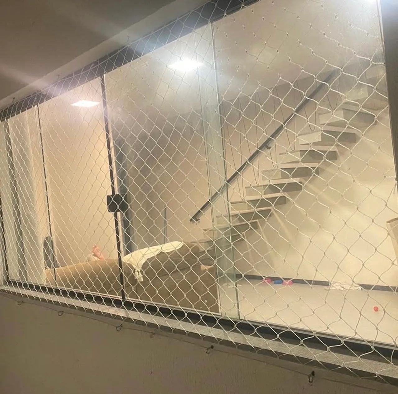 Rede de proteção para janelas, sacadas e coberturas