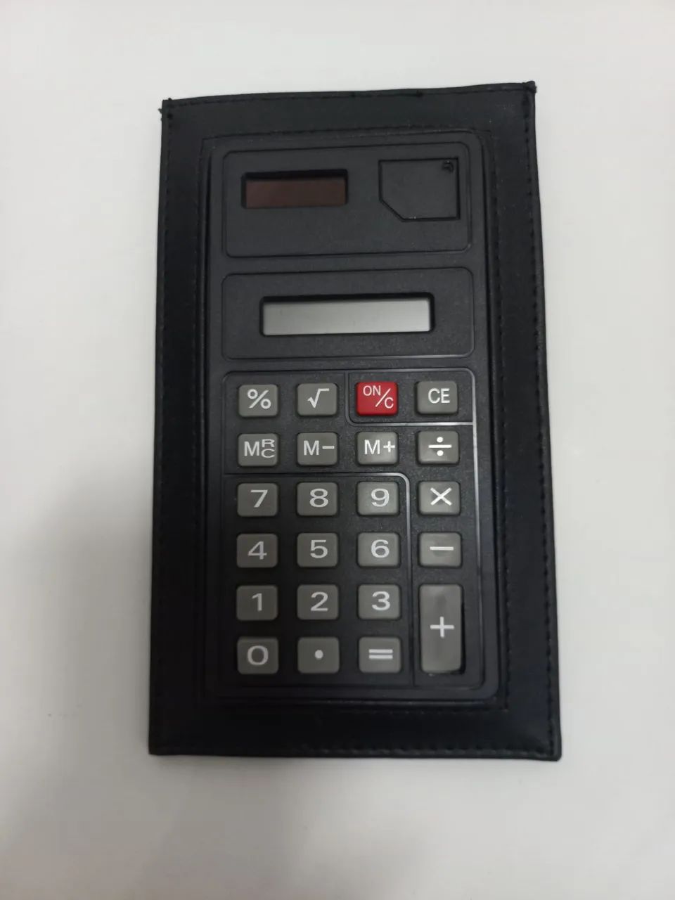 Calculadora embutida no couro 