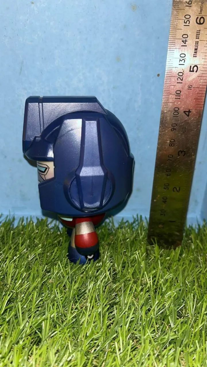 Boneco Transformers Mighty Muggs Optimus Prime Hasbro - Foto 3