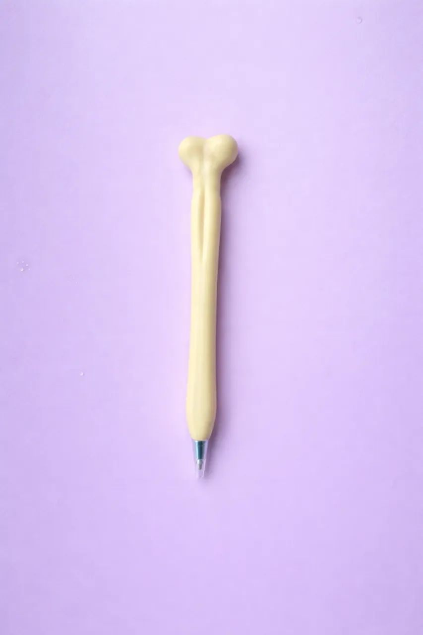 Caneta formato de ossos