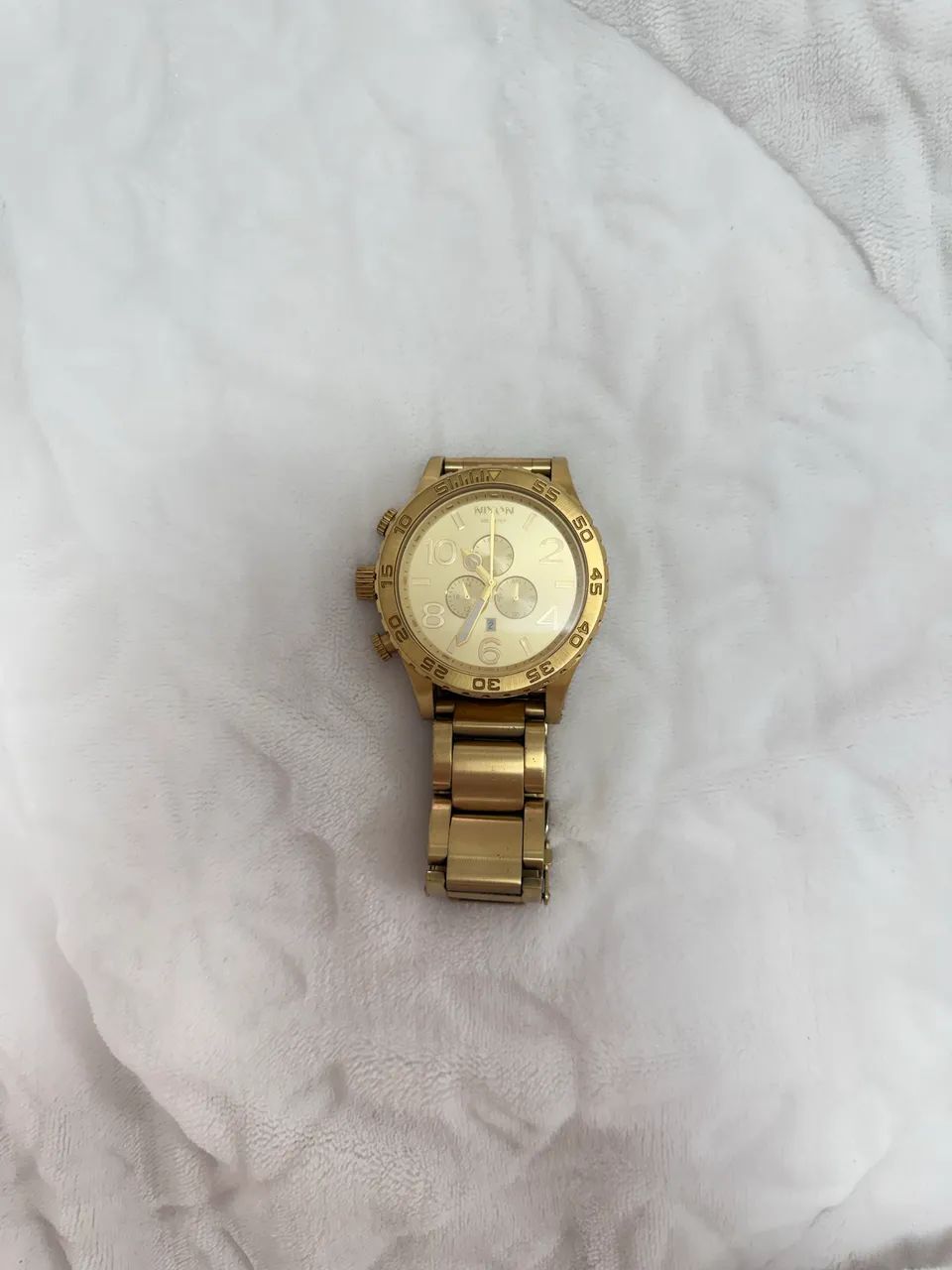 Relógio Nixon 5130 dourado 